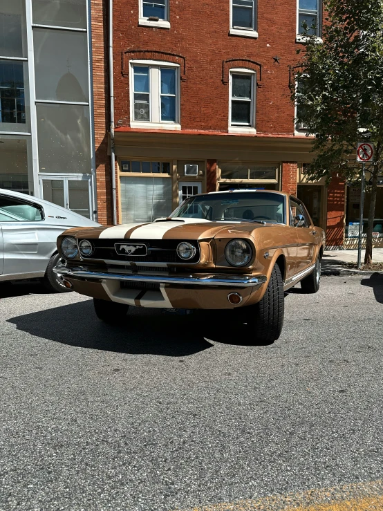 two cars are parked in front of the building