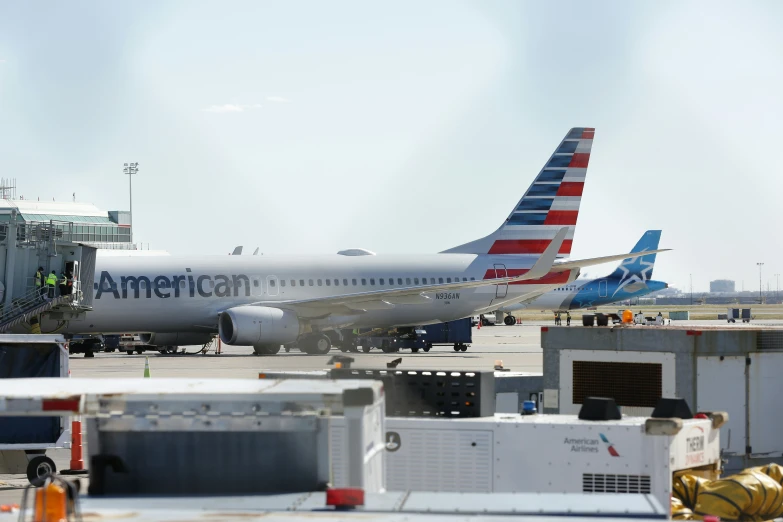 the large airplane is on the tarmac for all passengers to board