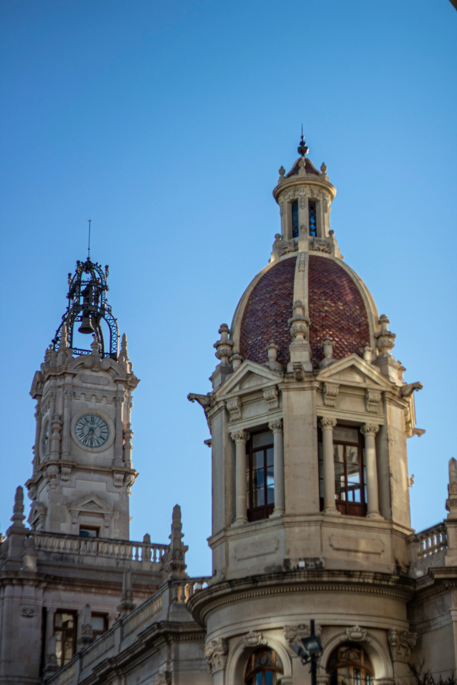 the building has a clock on the tower