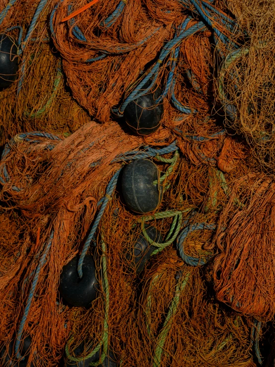 there are many old fishing nets piled together