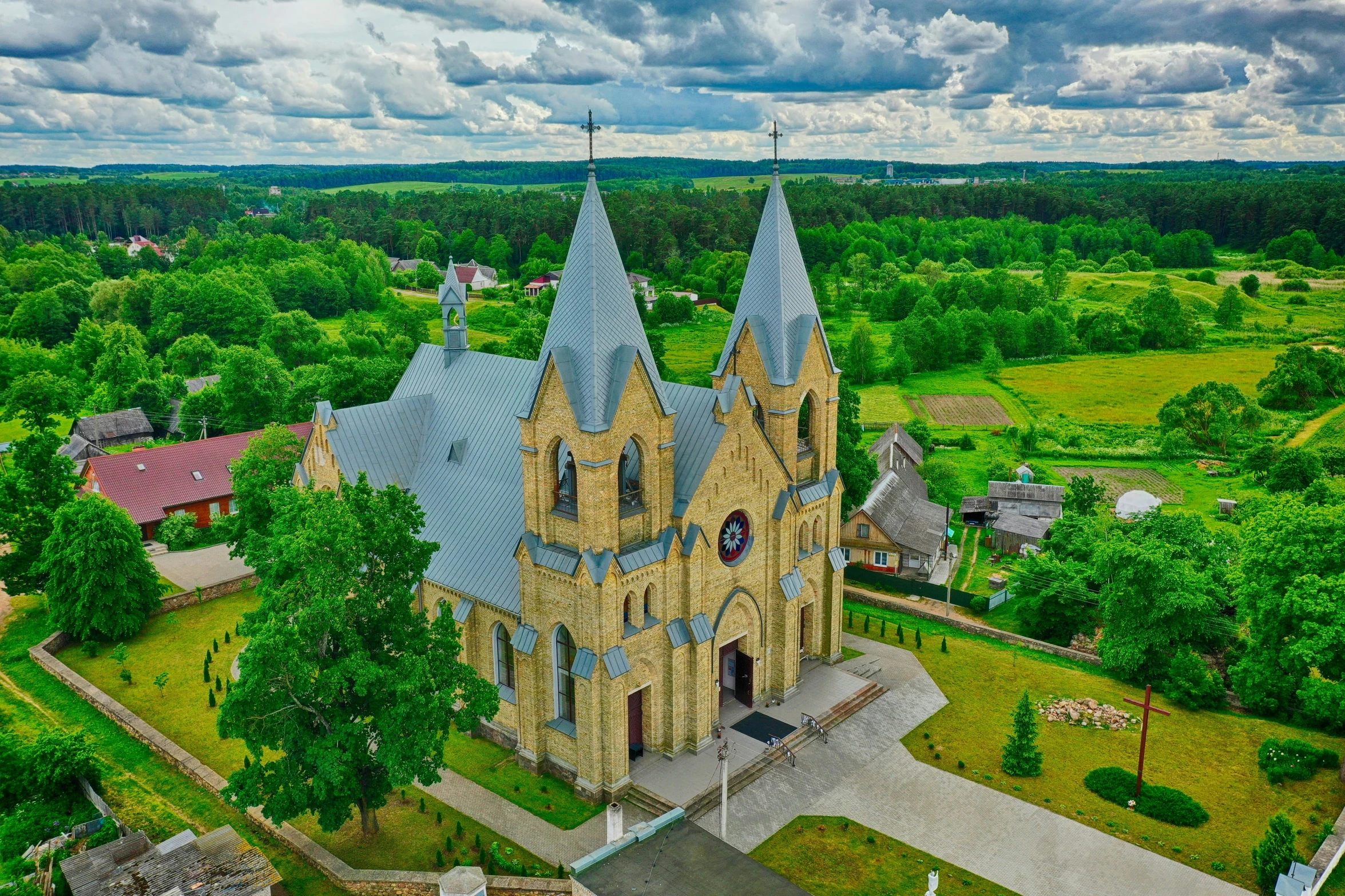 an aerial view of a very pretty old church