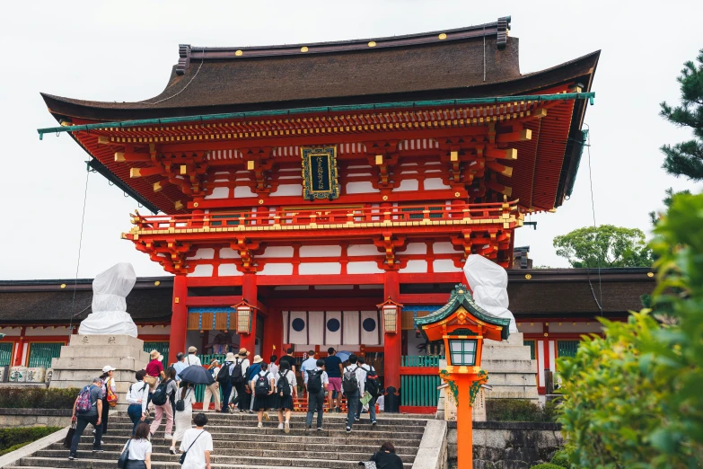 a pagoda building sitting on top of a lush green field