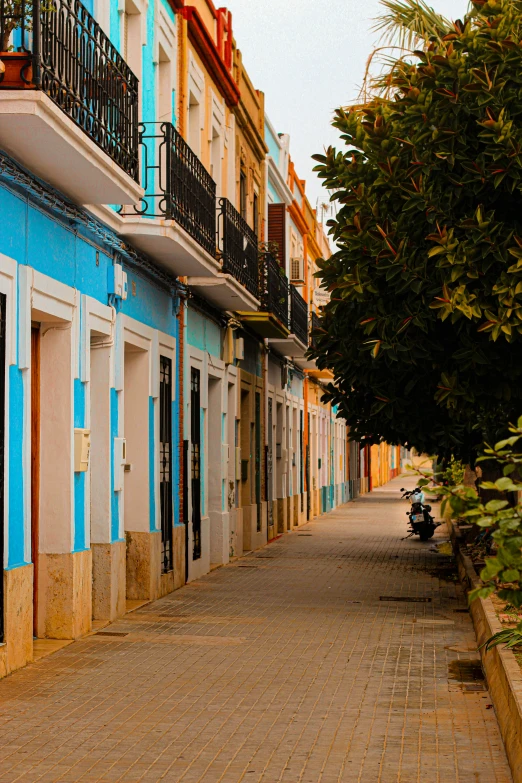 a building in the area with blue trim and windows