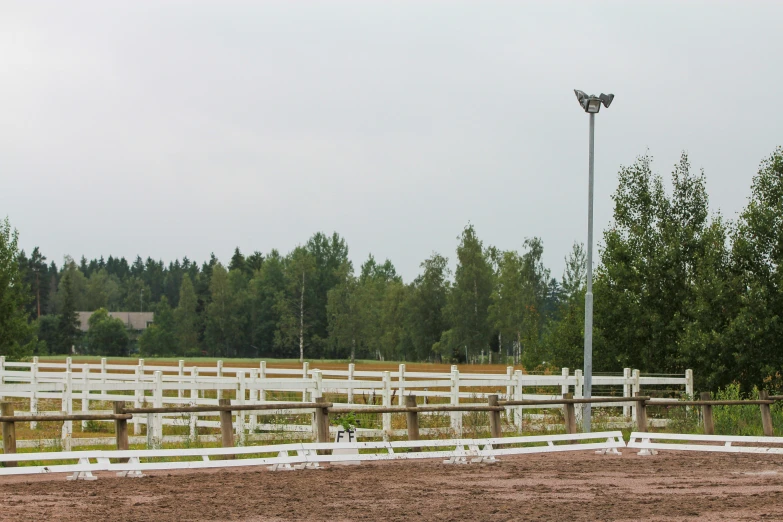 a horse pens and track next to an area