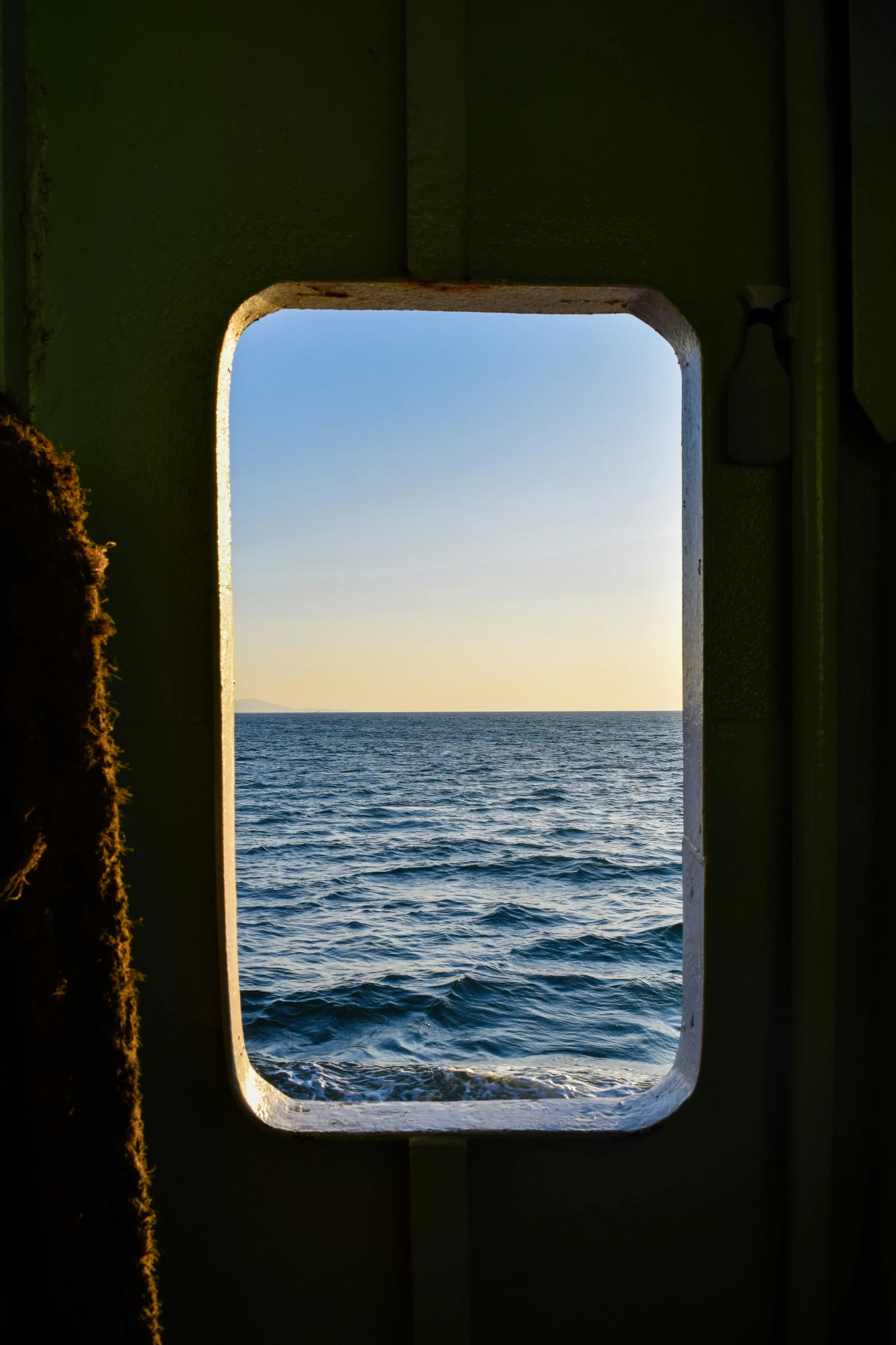 view out window on an ocean ship looking at the water