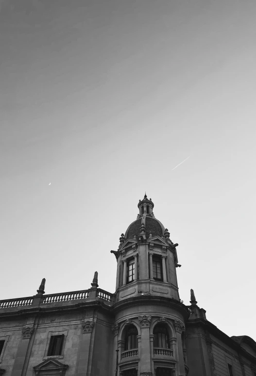 a large building with a clock on the side