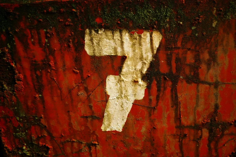 an image of number 7 on a rusty surface