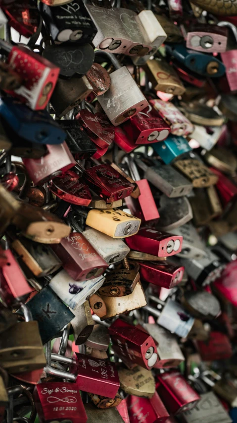 a pile of different types of locks with different color locks