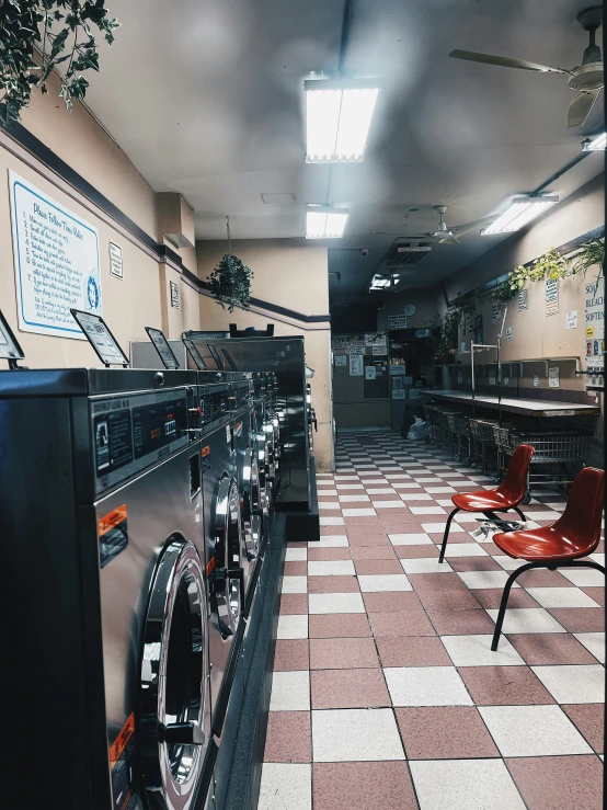 a room that has a bunch of chairs in it