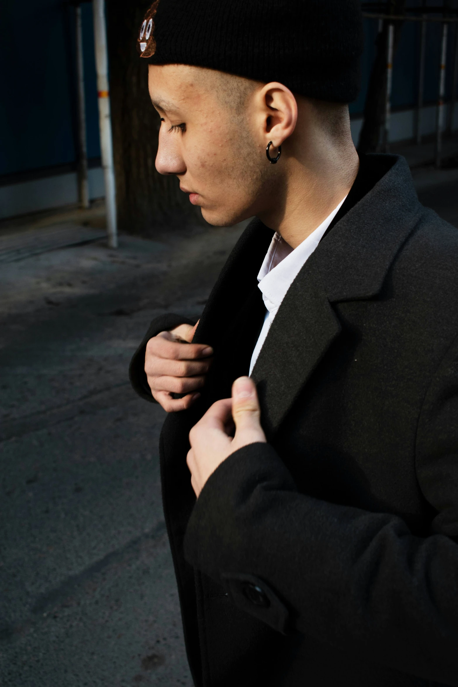 a young man is getting ready for his turn to wear