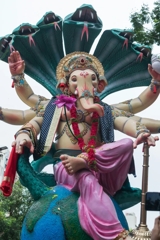 there is an elephant statue at the festival