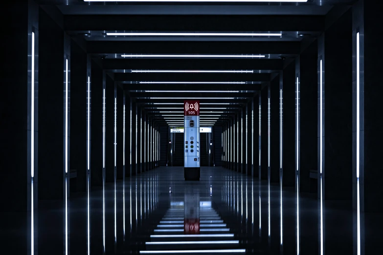 the interior walkway inside a building with lights and lines