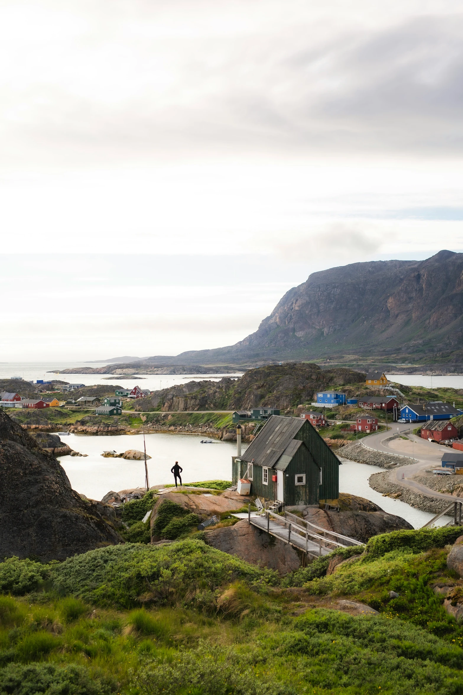 the view shows an almost farm like area with mountains