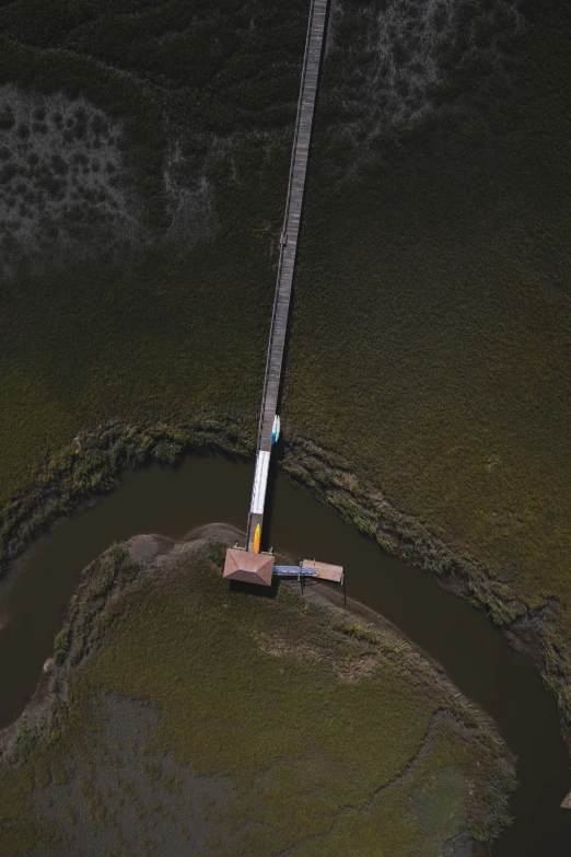 the large cross is at the top of a hill