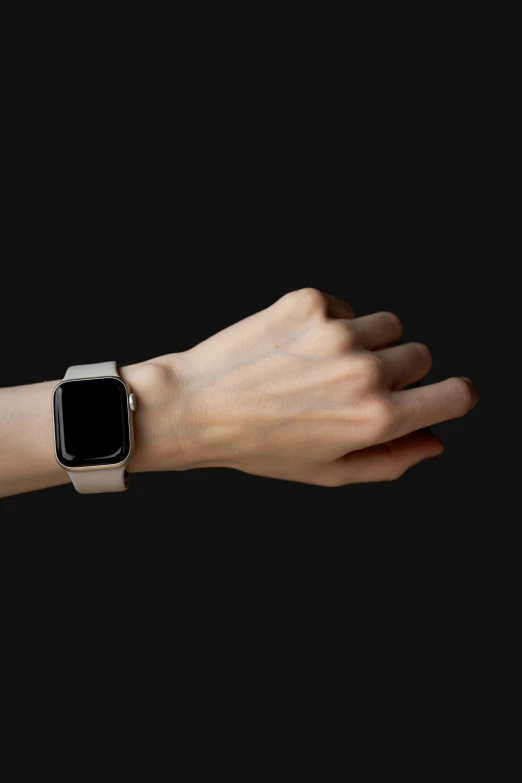 a close up of a person with a watch on their wrist