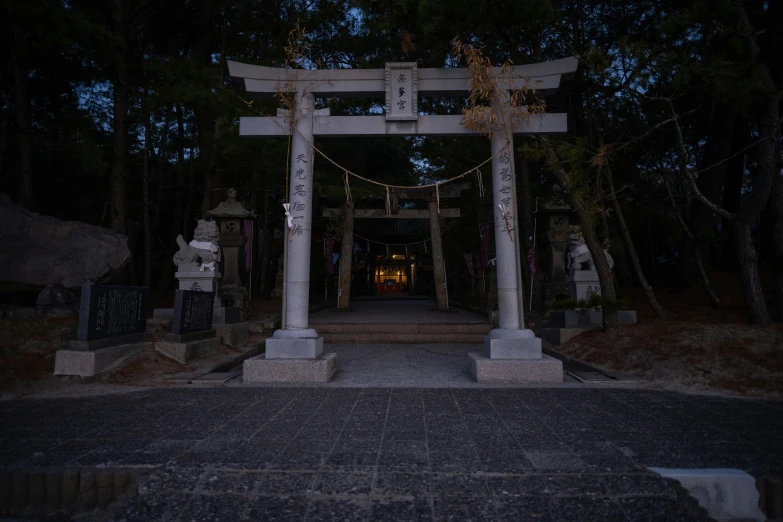 a temple gate at night with no lights