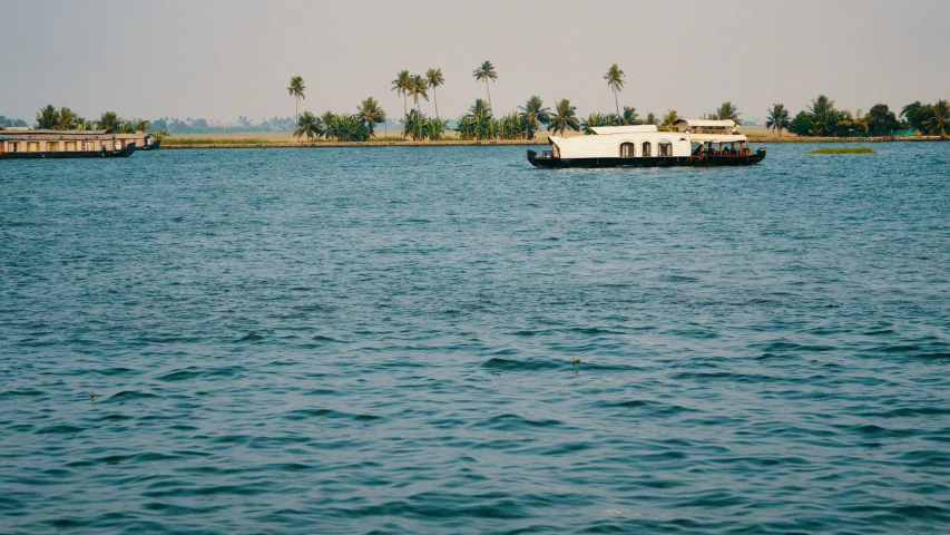 a couple of boats are in the water