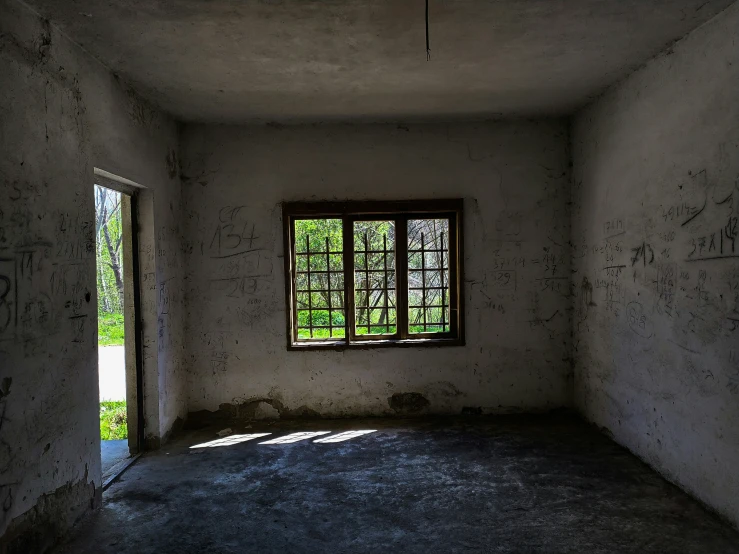 a dimly lit room with some kind of window