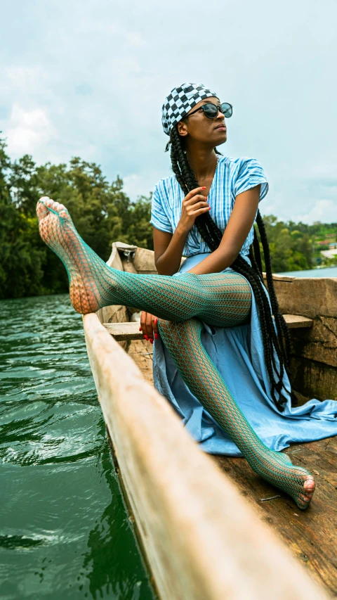 a woman with her feet in the water