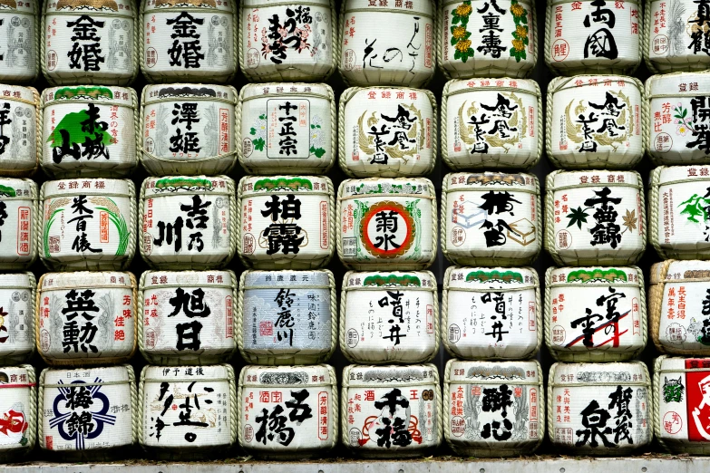 japanese rolls are stacked neatly against each other on display