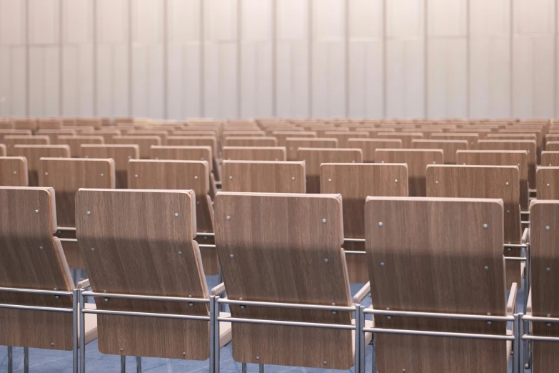 rows of wooden chairs in front of metal railing