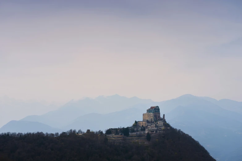 an over head s of an old castle atop a hill