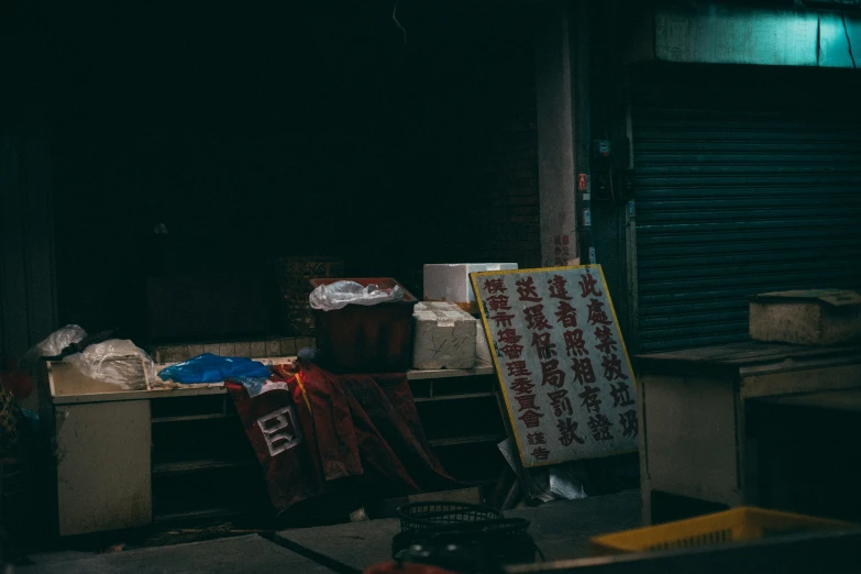 a street side with several signs and trash