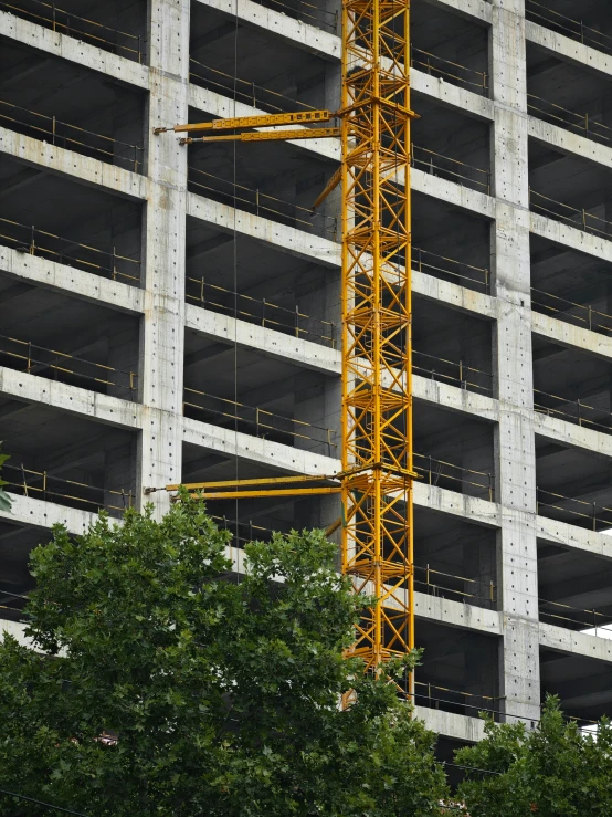 a view of the side of a large building under construction