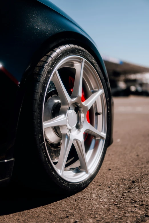 this is a tire on a black car