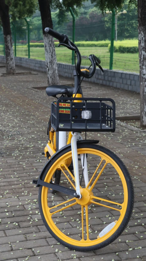 an image of a bicycle with a basket attached to it