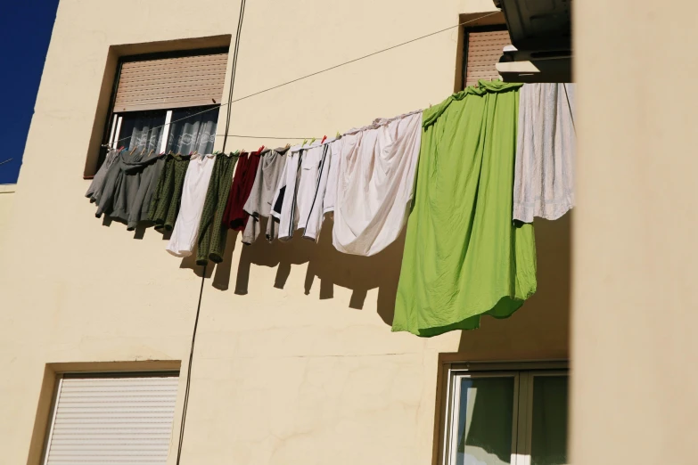an array of laundry hanging out to dry on a clothes line