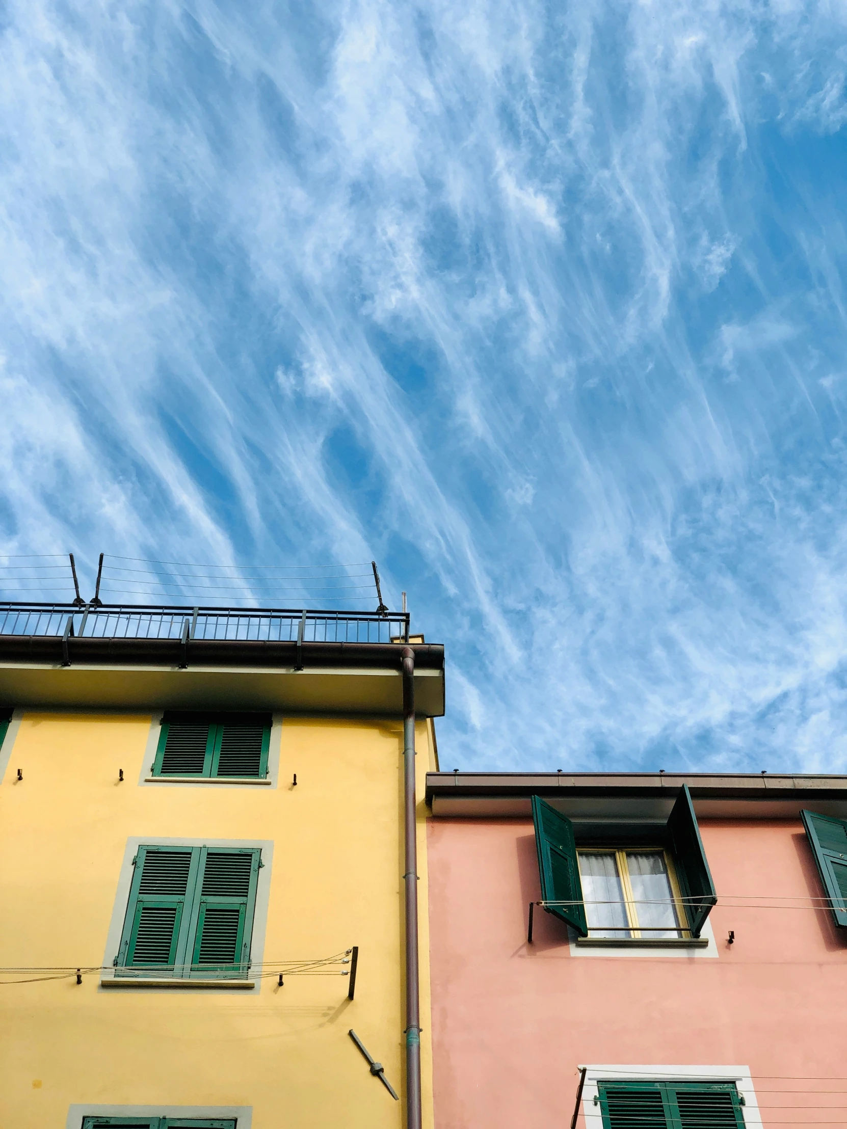 two buildings and the sky are visible for the pographer