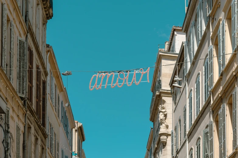 the clothesline is displayed in a town street