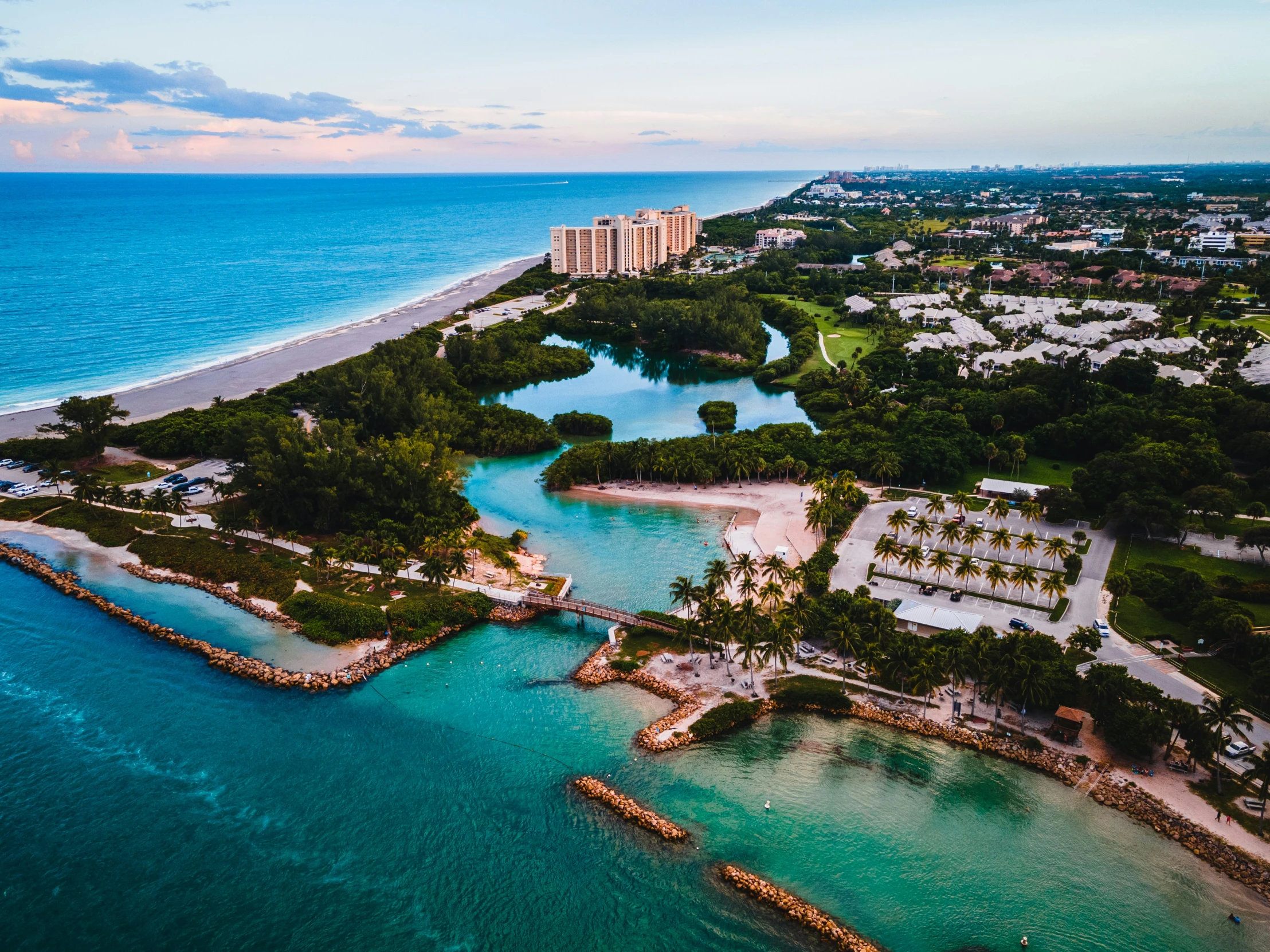 an aerial po of a tropical island in the ocean