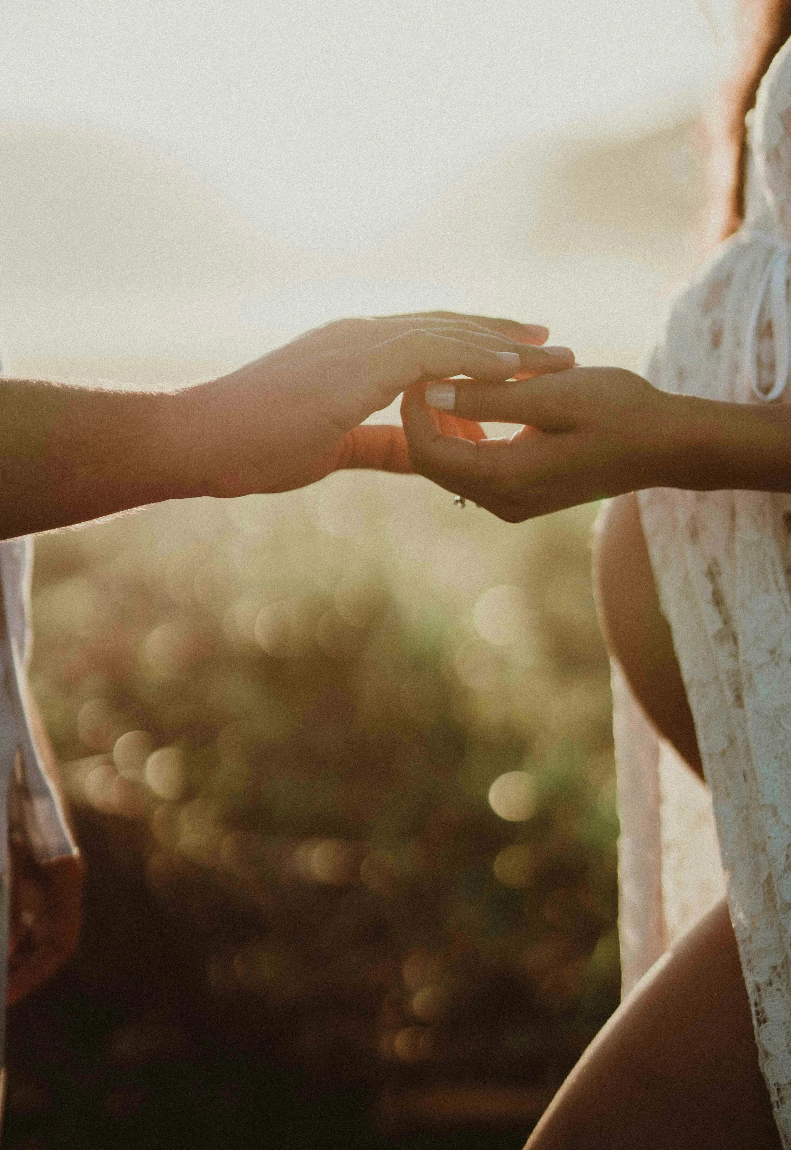 two women in their twenties hold hands