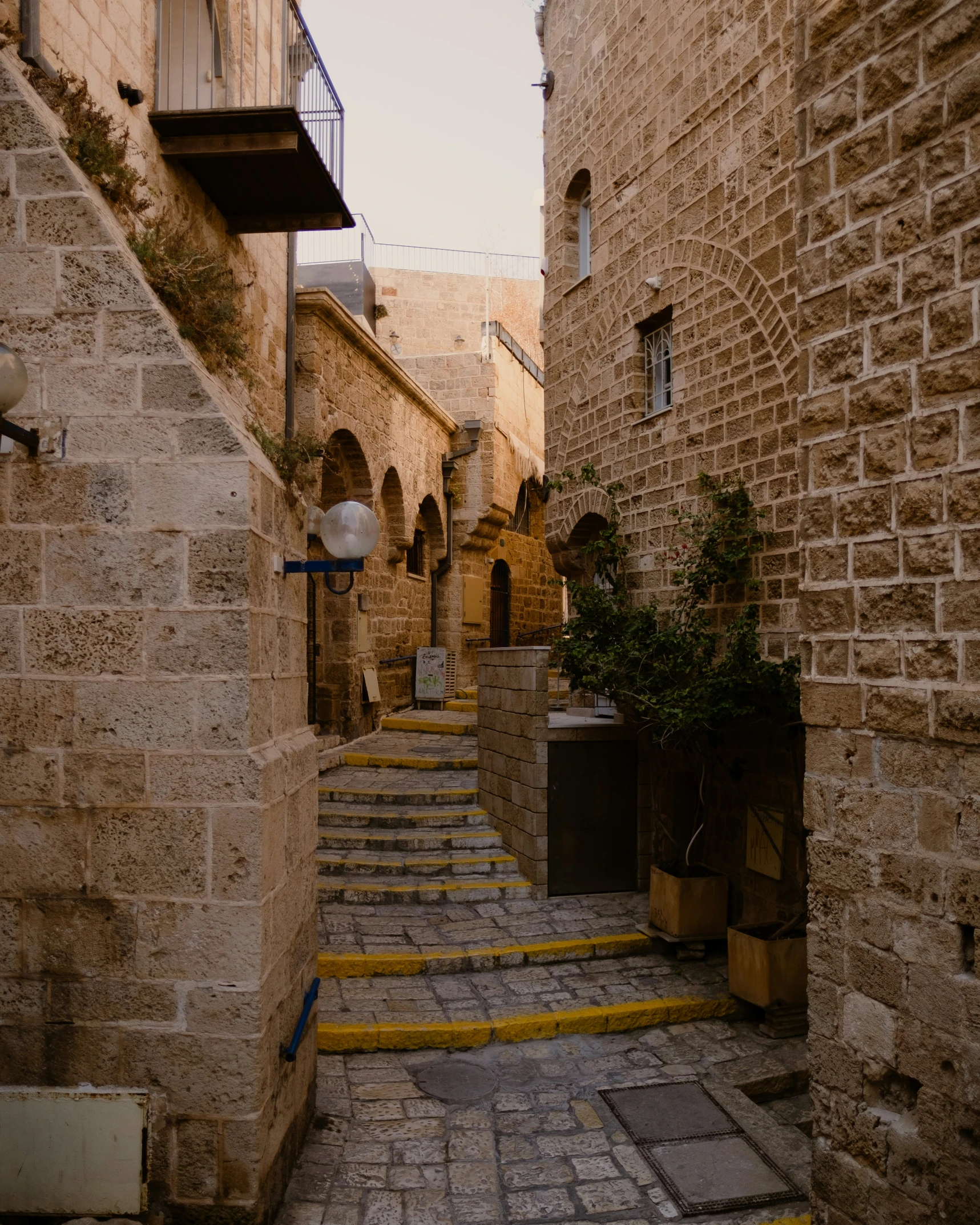 a city street with several stone buildings