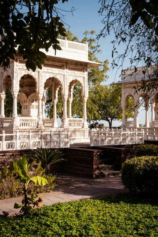 the gazebo has arches and columns all around