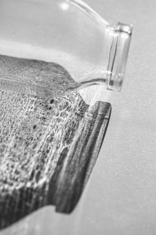 a close up of an empty glass bottle