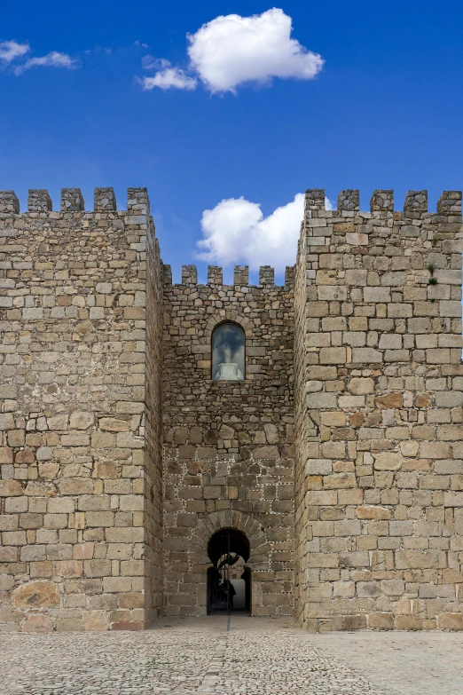 an old castle entrance is shown from inside