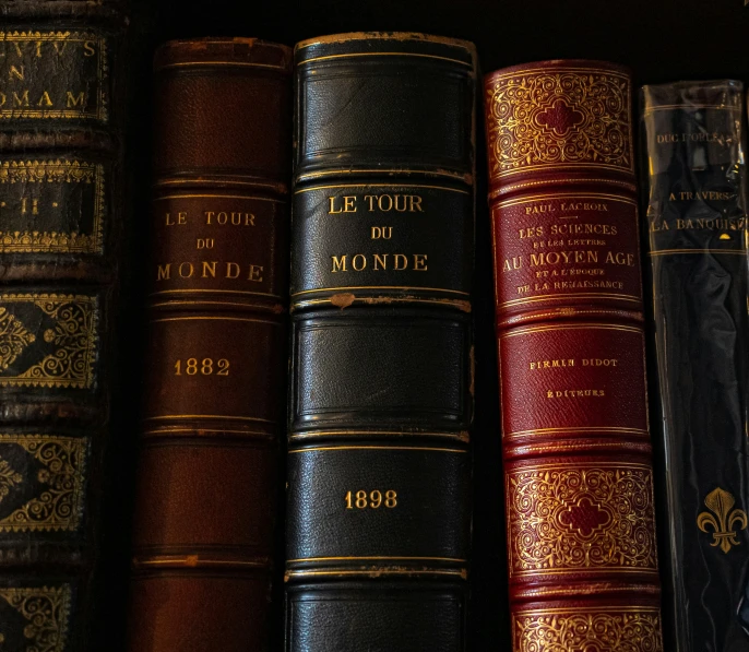 old leather books on the shelf in the liry