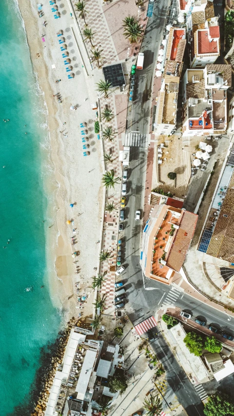 an aerial s of a beach, ocean, and els