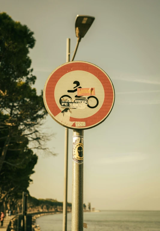 an image of a road sign showing bike on it