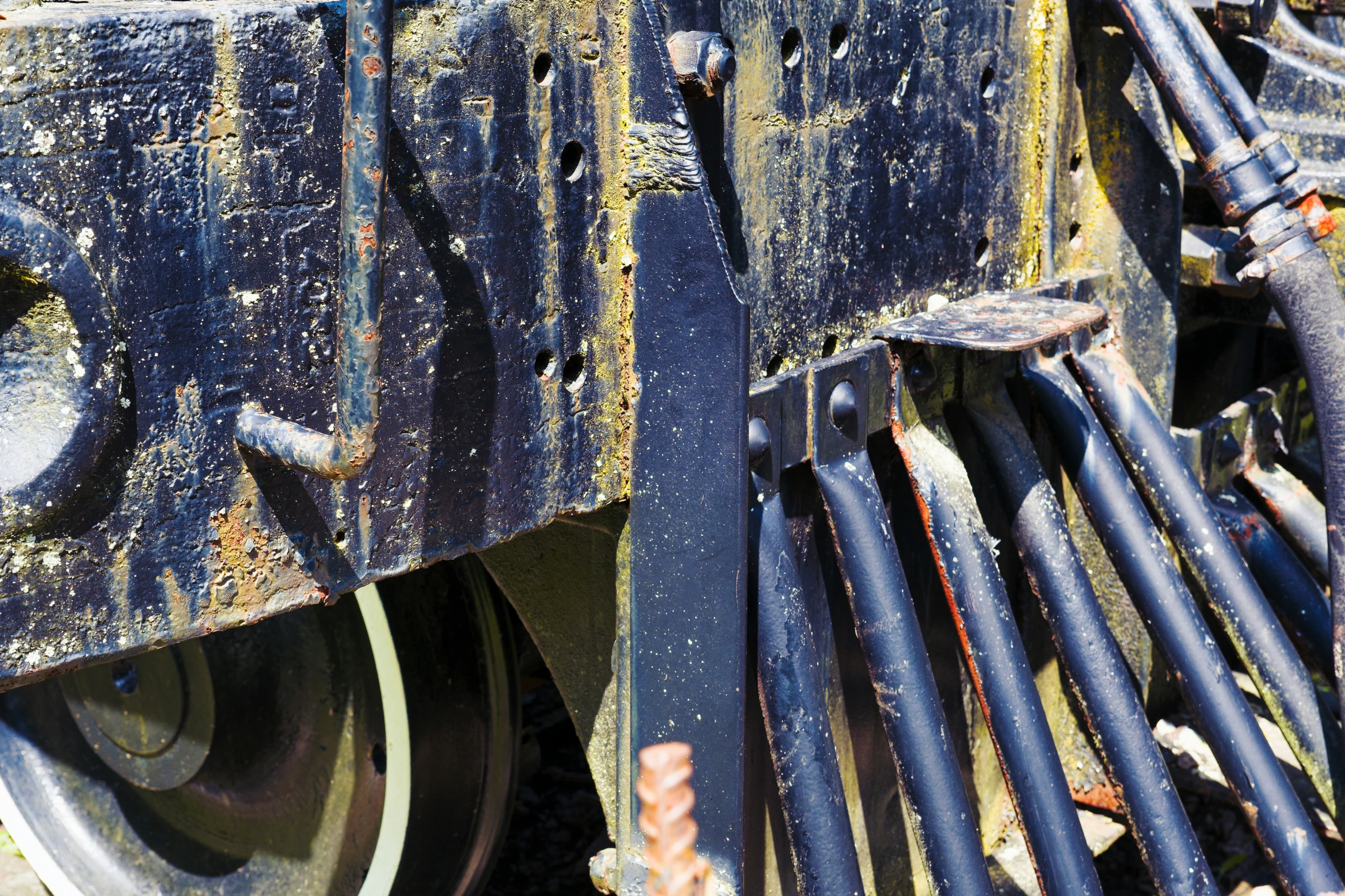 an old train engine is painted black