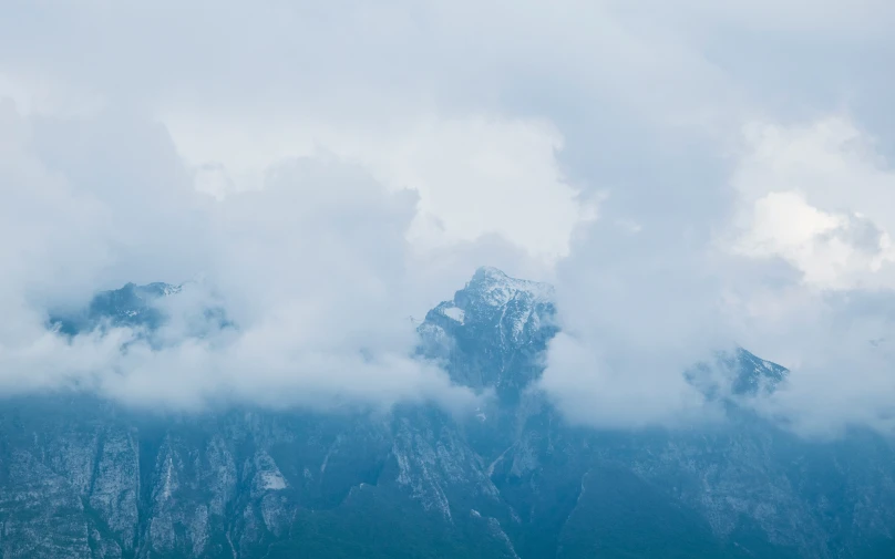 mountains with low clouds in the sky