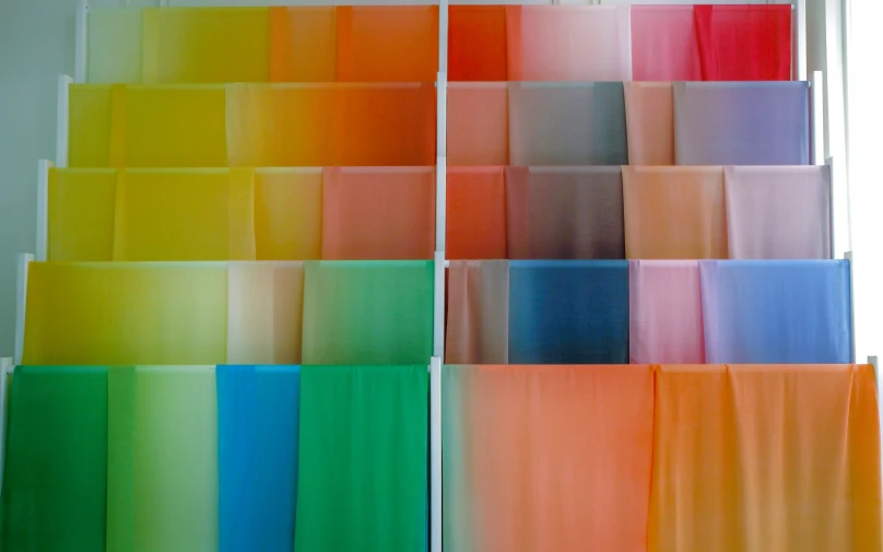 a set of multicolored curtains made up of squares