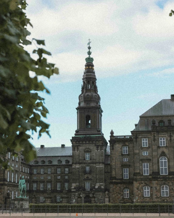 an old building with a tower in the center