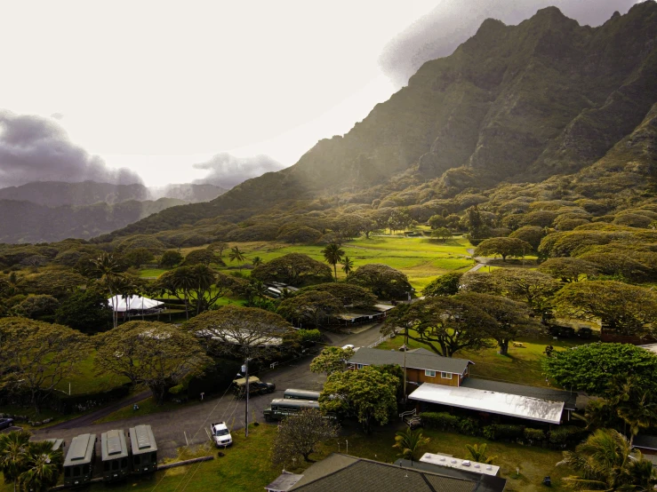 an aerial view of the mountains surrounding a park and a campground