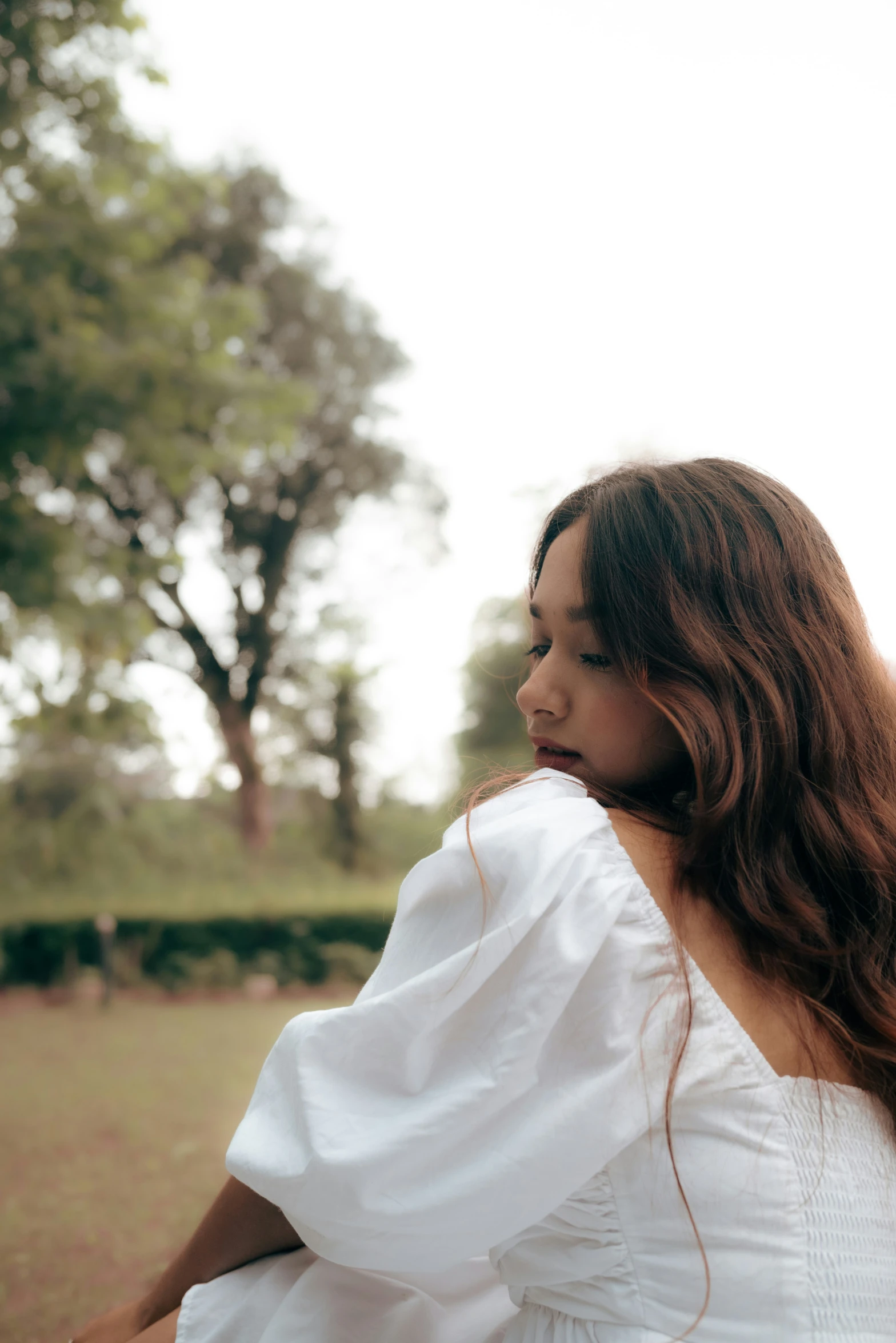 a close up of a woman with long hair