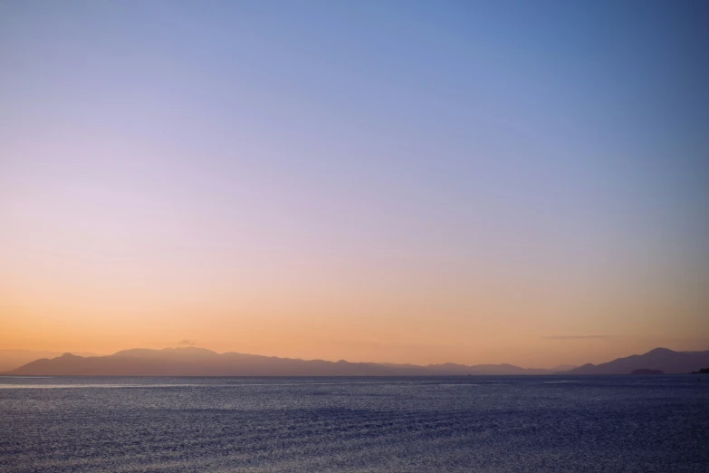 a view of a body of water during the sunset