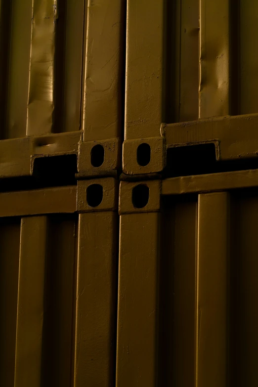 the three steel bars on the side of a building